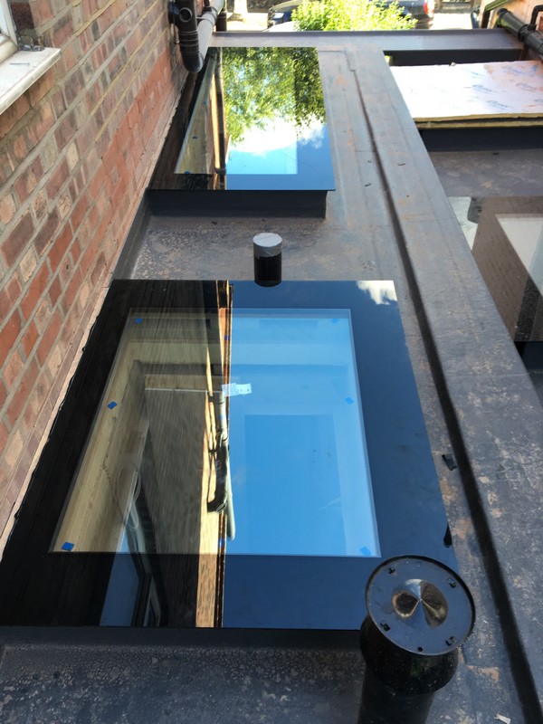 Multiple flat roof skylights on extension in Cricklewood